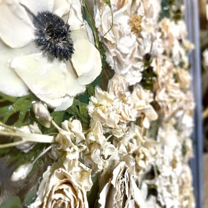 A close up of flowers on display in a store.